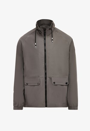Gray waterproof jacket with a high collar, front zip closure, two snap-button pockets, and drawstring accents on the hood.