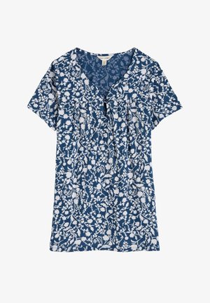 Tumesinine lilleline topp, millel on V-kaelus, lühikesed varrukad ja lõdva lõige. Kujunduses on valged lilled ja keerlevad lehed.