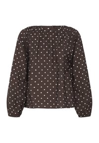 Blouse noire à manches longues avec des pois blancs, des poignets élastiques et un col froncé.