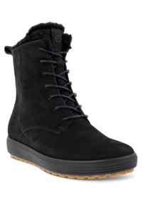 Botas de tobillo de ante negro con borde de piel sintética, que presentan cordones oscuros, puntera redonda y suela de goma con un patrón de agarre texturizado.