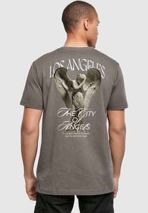 Gray graphic t-shirt featuring a large angel design on the back, with the text "Los Angeles" and "The City of Angels" printed above and below.