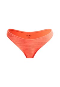Bas de bikini orange en tissu texturé, design en V et bords sans couture, avec une étiquette à l'intérieur contenant le nom de la marque et les détails de taille.