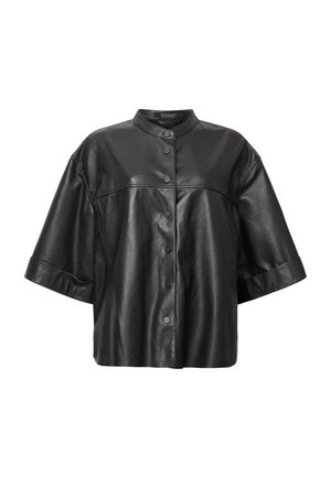 Fekete bőr rövid ujjú dzseki mandzsettás gallérral, elöl gombos záródással és sima felülettel. Ívelt vállrésszel és kényelmes szabással rendelkezik.