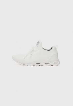 White athletic shoes featuring a textured knit upper, flat laces, and a cushioned sole with visible air chambers for added support.