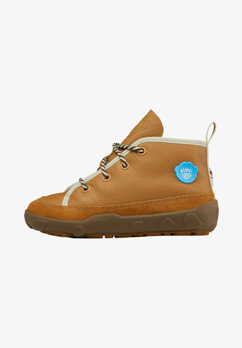 Brown leather ankle boots with a suede toe, white accents, and a textured rubber sole. Features gray and white patterned laces and a blue logo.