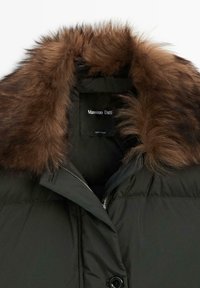 Dark green padded coat with brown faux fur collar and visible silver zipper, showing Massimo Dutti brand label inside.