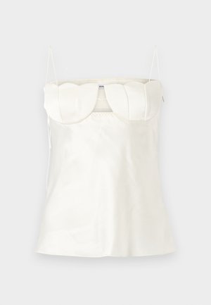 Caraco en satin blanc avec bretelles réglables, un bustier structuré et festonné, et un ourlet droit. Texture lisse et design minimaliste.