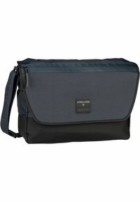 Borsa a tracolla in blu navy e nero, realizzata in tessuto con finitura strutturata. Presenta una chiusura a pattina, una tracolla regolabile e dettaglio con logo.