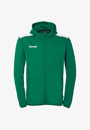 Grøn zip-up hoodie med en blød tekstur, hvide skulderdetaljer og "Kempa" logoet på brystet. Har lommer og hætte.