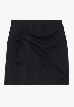 Black mini skirt with a ruched side detail and bow accent. Made of a smooth, stretchy fabric with a fitted waist and a clean hem.