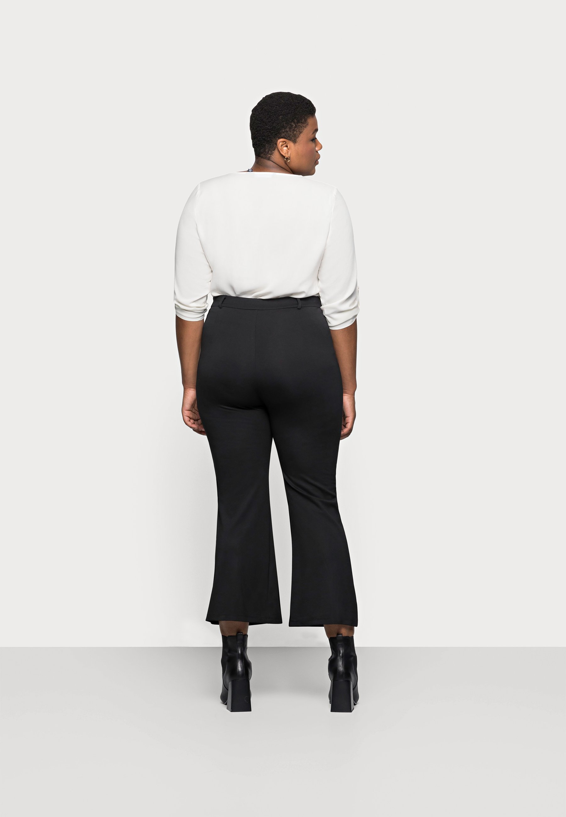 Femme Flared PUNTO trousers - Pantalon classique Femme Flared PUNTO trousers - Pantalon classique