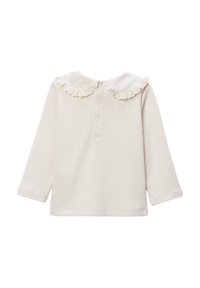 Haut à manches longues en tissu côtelé crème, avec un col orné de dentelle blanche et des boutons à l'arrière. Design doux et texturé.