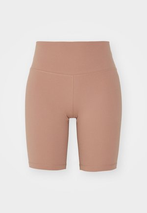 Hoge taille fietsbroek in een beige kleur, gemaakt van rekbaar materiaal, met een gladde textuur en schone naden voor comfort en pasvorm.