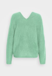 Pull vert menthe en maille avec col en V, coupe ample et manches longues. Présente un motif texturé sur l'ensemble du tissu.