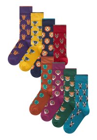 Gemischte Socken mit Tiermustern: Giraffen, Elefanten, Löwen und Tiger in lebhaften Farben wie Lila, Gelb und Grün.