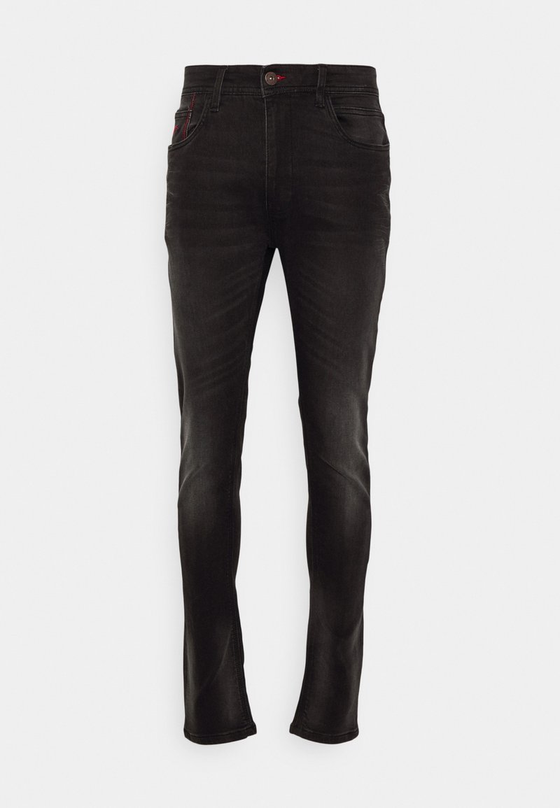 Jean en denim noir à coupe slim, avec une légère décoloration, des accents de couture rouge, un design à cinq poches et une fermeture à bouton sur le devant.