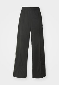 adidas Originals FIREBIRD LOOSE - Tracksuit bottoms - black