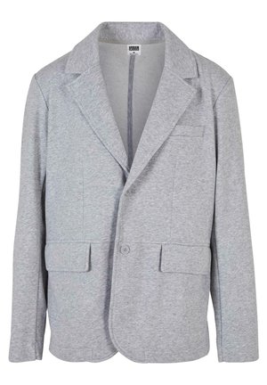 Siv blazer iz mehkega, teksturiranega materiala. Ima ovratnik s režo, dve sprednji žepih in enojno zapiranje na gumb.