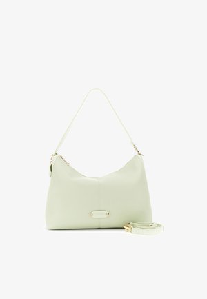 Sac à bandoulière en cuir vert clair avec une fermeture éclair dorée, une sangle détachable posée à côté, et une petite plaque de marque dorée à l'avant.