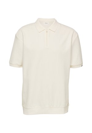 Polo à manches courtes de couleur crème avec des rayures horizontales texturées et une fermeture éclair à l'avant au lieu de boutons.