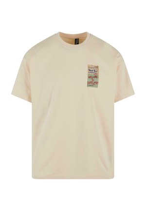 Kortærmet, lysebeige t-shirt lavet af bomuld. Har et trykt grafisk lomme-design med tekst i forskellige farver. Rund halsudskæring.