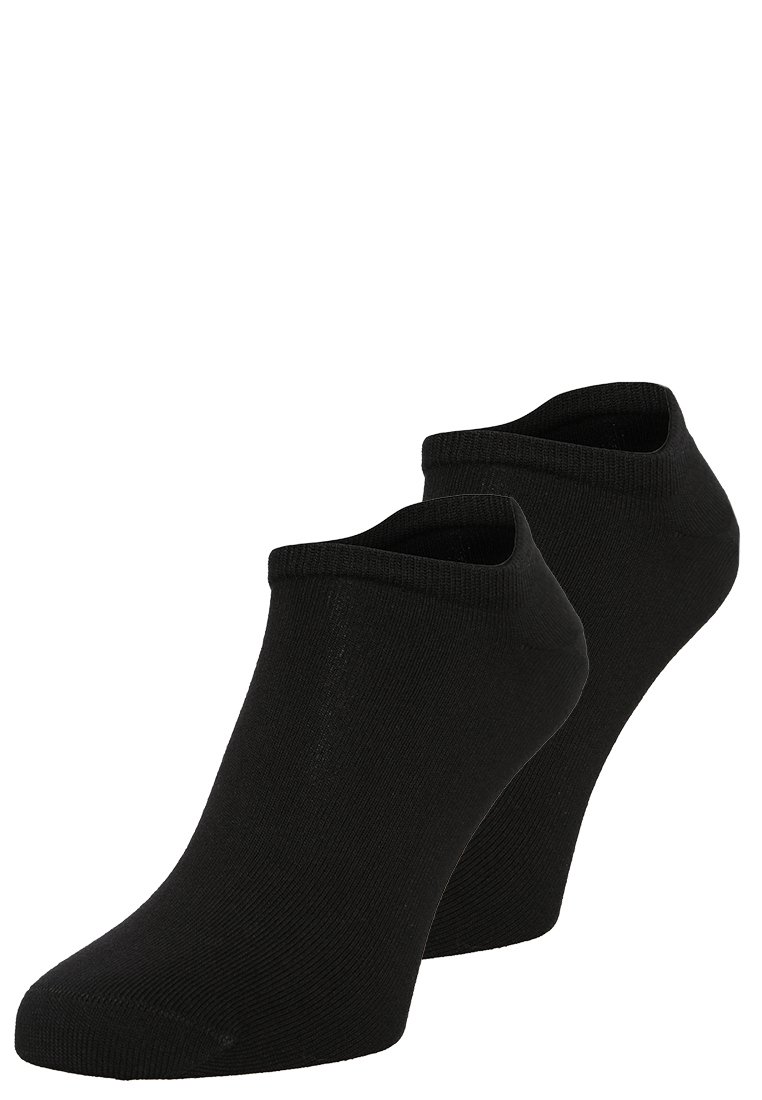 Chaussettes no-show noires en tissu doux et extensible. Dotées d'un poignet côtelé pour un maintien sécurisé et d'une texture lisse. Sans motifs ni accents.