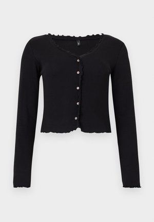 Cardigan court noir à manches longues avec petits boutons blancs, bords froncés au niveau de l'encolure, de l'avant, de l'ourlet et des poignets.