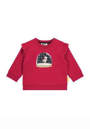 Red sweatshirt with frill accents, featuring a snow globe design with a character inside. Made of soft fabric, round neckline, and long sleeves.