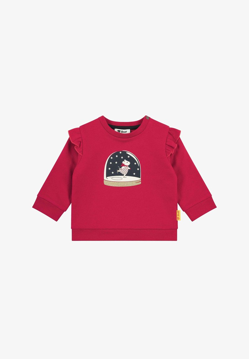 Sudadera roja con adornos de volantes, que presenta un diseño de bola de nieve con un personaje en su interior. Hecha de tela suave, con cuello redondo y mangas largas.