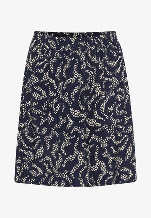 Jupe marine avec une taille élastique, présentant un motif abstrait blanc, en tissu léger et avec une silhouette légèrement évasée.