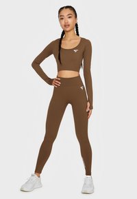SQUATPROOF Tights - coffee