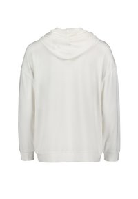 Sweat à capuche blanc à manches longues vu de dos, avec une coupe décontractée, des épaules tombantes et un ourlet et des poignets côtelés.