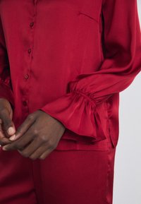 Lindex SET FLOUNCE - Pyžamová sada - red