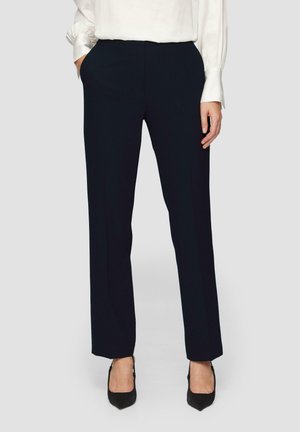 Pantalons ajustés bleu marine avec une jambe droite, fabriqués en tissu lisse ; dotés de poches latérales et d'une taille mi-haute.