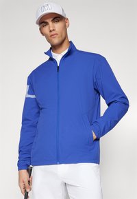 J.LINDEBERG Sports HEATH - Lauko striukė - clemantis blue