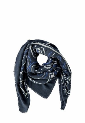 Écharpe bleu marine en forme carrée, ornée de motifs blancs et bleus complexes, avec des bords frangés et un tissu doux et texturé.