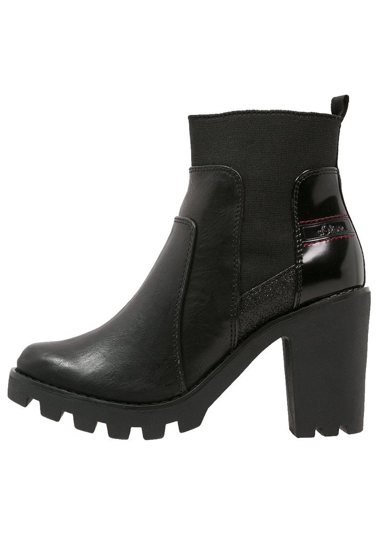 Bottines noires à talon épais, en cuir lisse et texturé, avec un dessus en tissu élastique et des coutures d'accent rouge subtiles.