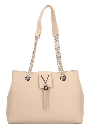 Beige handbag made of textured synthetic material, featuring silver chain straps and a clasp with a V design and tassel detail.
