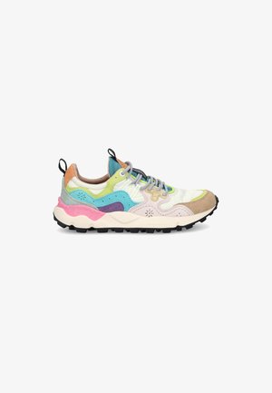 Multicolor athletic sneaker with beige, blue, green, pink, and purple suede and fabric panels, thick white sole, and gray laces.