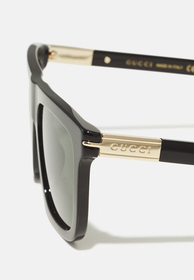 Gucci Slnečné okuliare - black/grey