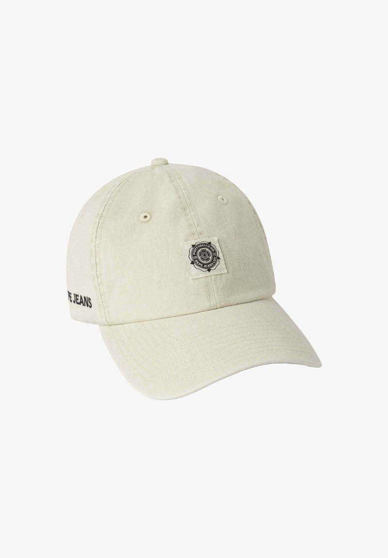 Gorra de béisbol de algodón beige claro con un parche de logo cosido y el texto "PREFECT JEANS" bordado en el lateral. Diseño de visera curvada.