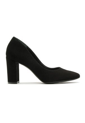 Pumps nere in suede con tacco alto, punta affusolata, tomaia liscia e tacco spesso. Design minimalista senza accenti o motivi visibili.
