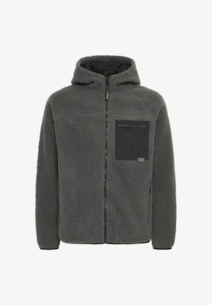 Flisjakna v temno sivi barvi s mehkobo, kapuco, polno zadrgo in črnim žepom na prsih z zadrgo. Ima kontrastne šive.