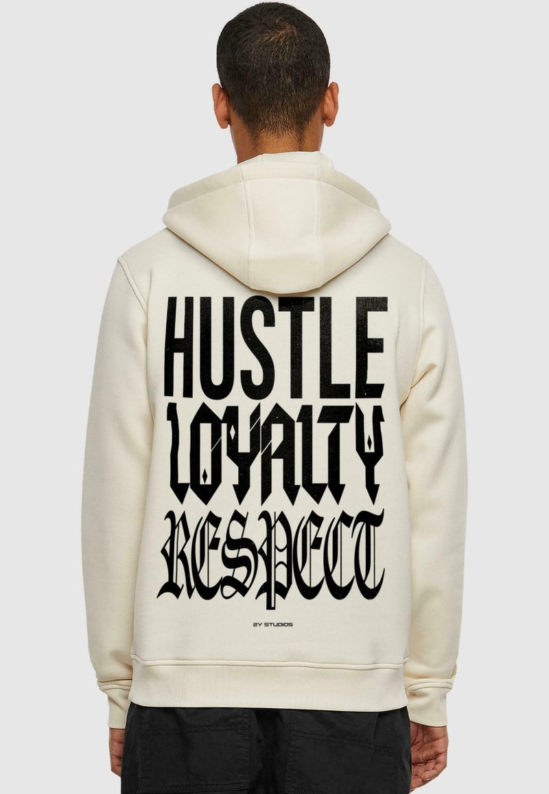 Cream hoodie featuring bold black text on the back: "HUSTLE LOYALTY RESPECT." Soft fabric, relaxed fit, with a drawstring hood.