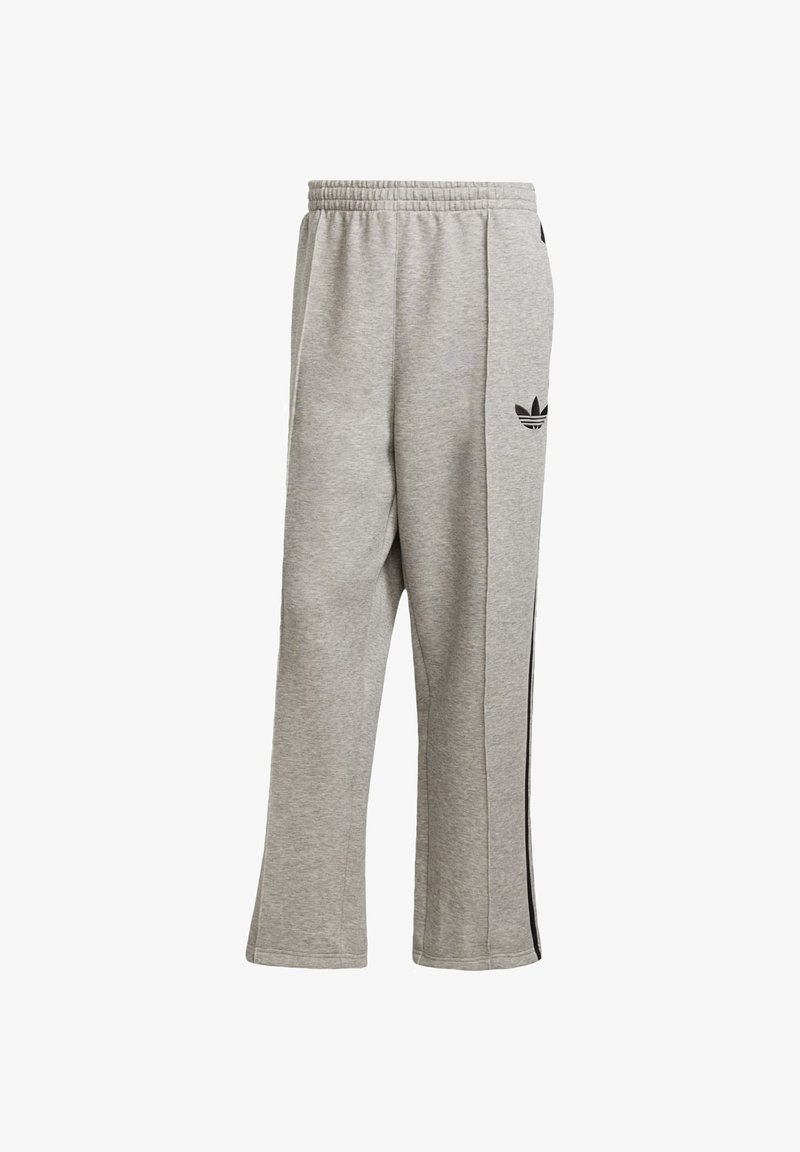 Chándal gris hecho de una mezcla de algodón, con un diseño de pierna recta, cinturilla elástica y franjas laterales negras con detalles de logo.