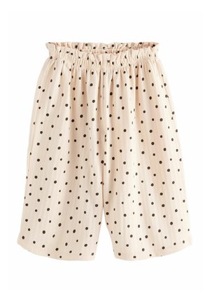Lyse beige løstsiddende shorts med sorte polkaprikker og elastisk rynket talje.