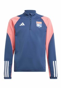 Granatowa bluza treningowa Adidas z różowymi akcentami na ramionach, pół-zamek z przodu, logo Olympique Lyonnais oraz białe detale w postaci trzech pasków na rękawach.