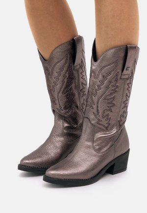 Kowbojki i obuwie motocyklowe