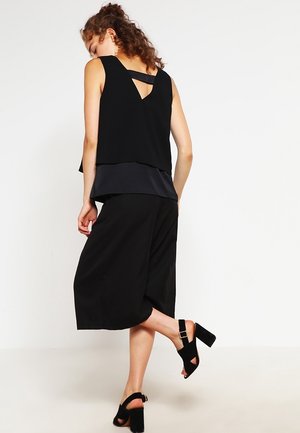 Camicetta - black