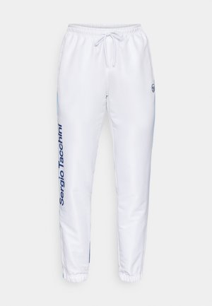 White track pants with elastic waistband and drawstring. Features a blue logo and brand name "Sergio Tacchini" on the side, fitted cuffs.